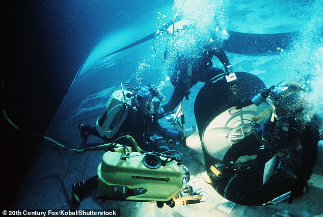 Underwater: 'We worked at a depth of 10 meters.  To move the camera on the bottom, I had heavy weights on my feet, no fins, a heavy belt around my waist,” Cameron said, adding that his equipment began to fail.