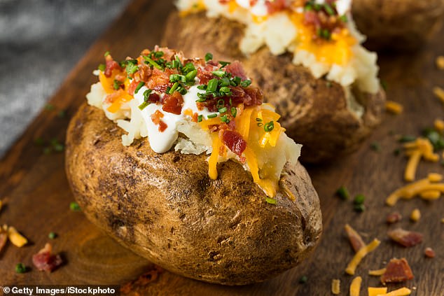 For most Americans, the toppings on baked potatoes are usually sour cream, bacon and cheese - but it seems this is not universal (stock image)