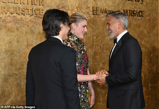 Regards!  Greta seemed excited to meet George Clooney at his charity event