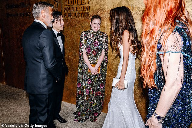 Superstar friends!  Greta seemed excited to come face to face with George's wife, human rights lawyer Amal Clooney, and fashion designer Charlotte Tilbury