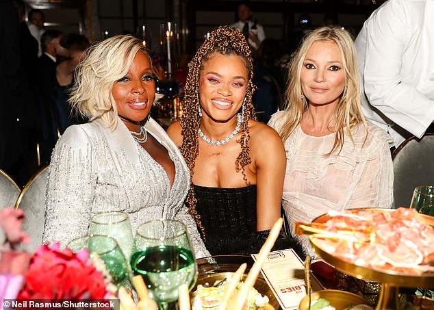 Align stars!  Andra sat with soul superstar Mary J Blige and fashionista Kate Moss as the festivities began