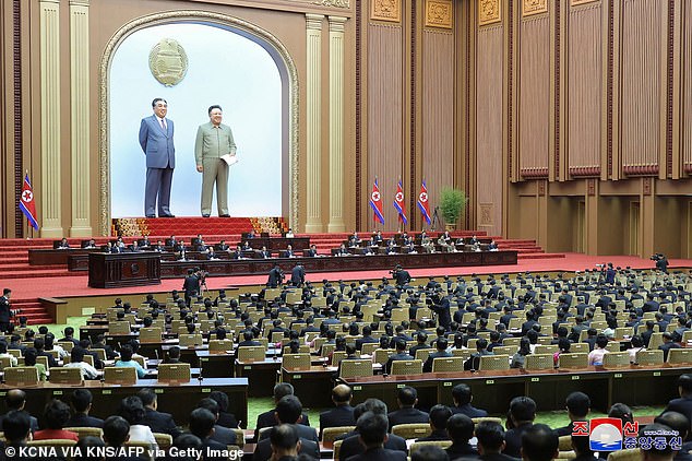 The slightly larger model of Kim Il Sung showed North Korea's founder – known as the 'Great Leader' in North Korea, dressed in his signature three-piece suit (left), while the model of the former 'Dear Leader ' of the country Kim Jong Il depicted him in his typical khaki military attire