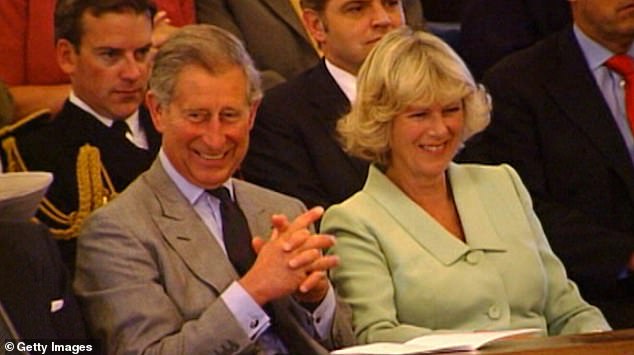 Prince Charles and Camilla, whom he would marry the following month, couldn't keep the smiles off their faces as they watched the ceremony 