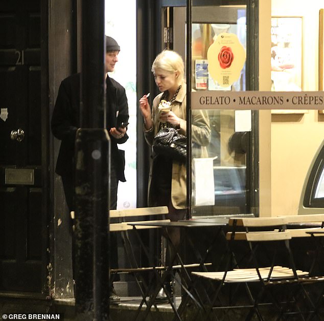 Sweet treat: Lucy seemed to enjoy her gelato while holding the tub