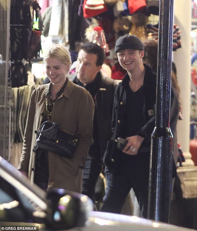 Smiling: The couple beamed as they walked home at the end of the evening