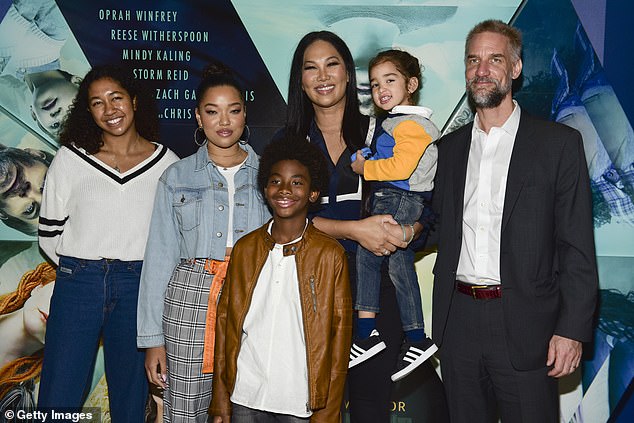 Family: The star is also mother to son Kenzo, 14, with Djimon Hounsou and son Wolfe, eight, with estranged husband Tim Leissner (pictured 2018) – she has a third son Gary Lee Foster who she adopted in 2020 at the age of 10