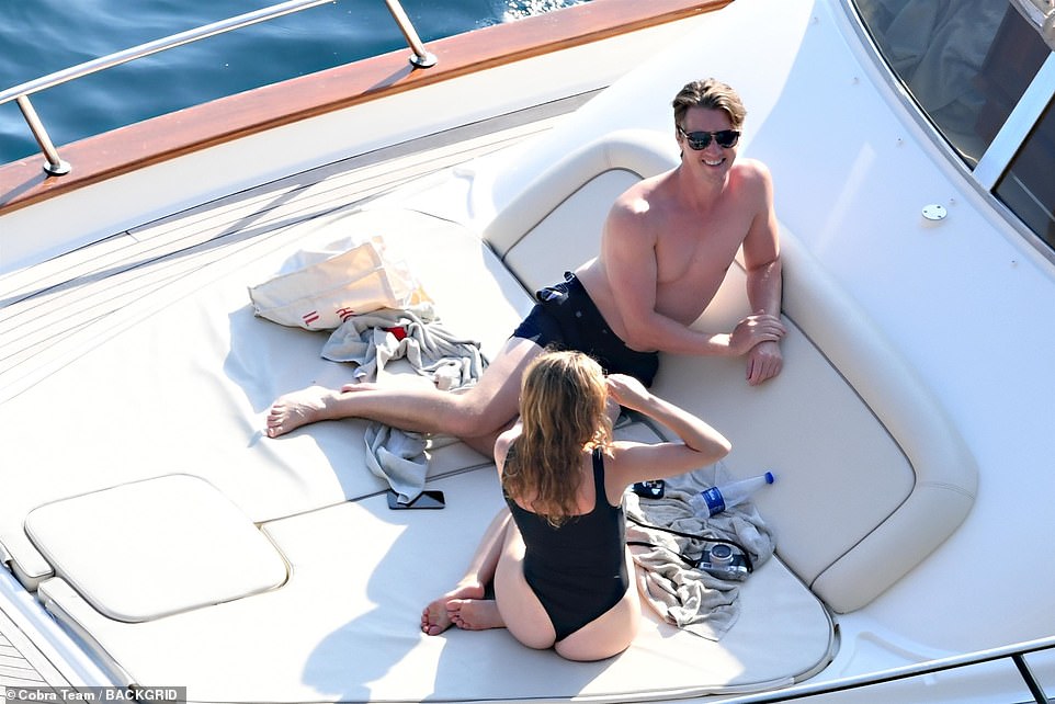 Pose: Joey took a few photos of her handsome new husband on board the yacht