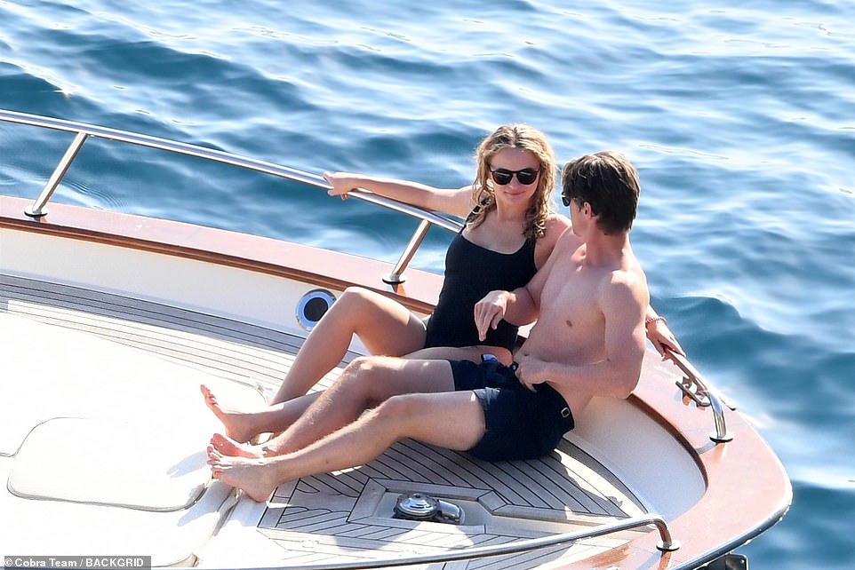 PDA: The couple hugged on board the yacht as they enjoyed their honeymoon