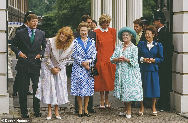 The British monarch Queen Elizabeth II (1926 - 2022) (center) poses with members of the royal family, from left the couple Prince Andrew, Duke of York, and Sarah Ferguson, Duchess of York, the Queen, the couple Prince Charles (and future Charles III) (behind the Queen) and Princess Diana of Wales (1961 - 1997) (in red)