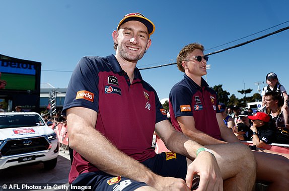 MELBOURNE, AUSTRALIA – SEPTEMBER 29: Harris Andrews (left) and Jaspa Fletcher of the Lions are seen during the 2023 AFL Grand Final Parade on September 29, 2023 in Melbourne, Australia.  (Photo by Michael Willson/AFL Photos via Getty Images)