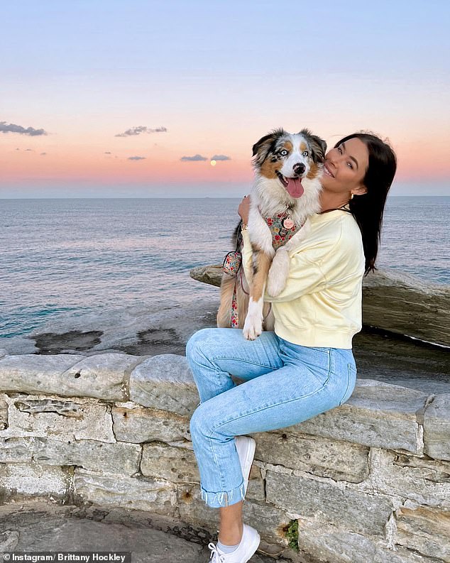 Brittany walks every day and has to 'put in some serious miles' to tire out her Australian Shepherd Delilah (pictured)