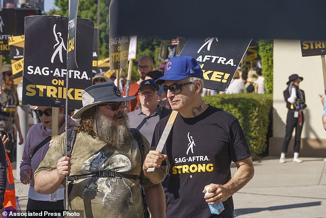 Actors Jack Black, left, and Bob Odenkirk join protesters outside the Paramount Pictures Studio in Los Angeles, Tuesday, September 26, 2023