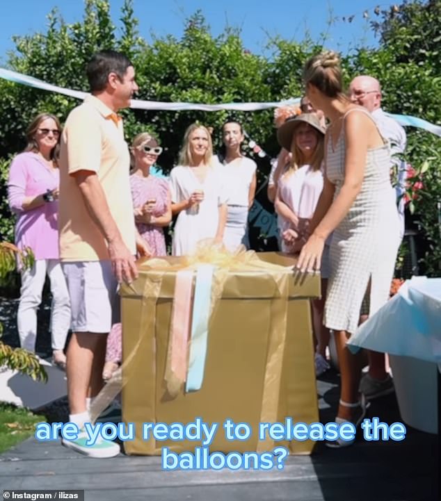 The announcement video is a parody of lavish gender reveal parties, with Iliza jumping out of a box