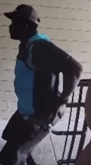 After pulling down his pants, the man rubs his butt on a railing