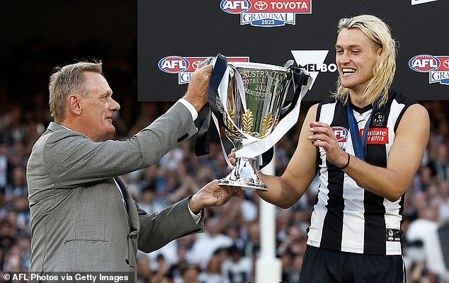 Peter (left) failed to win any of his five grand finals as a player for Collingwood