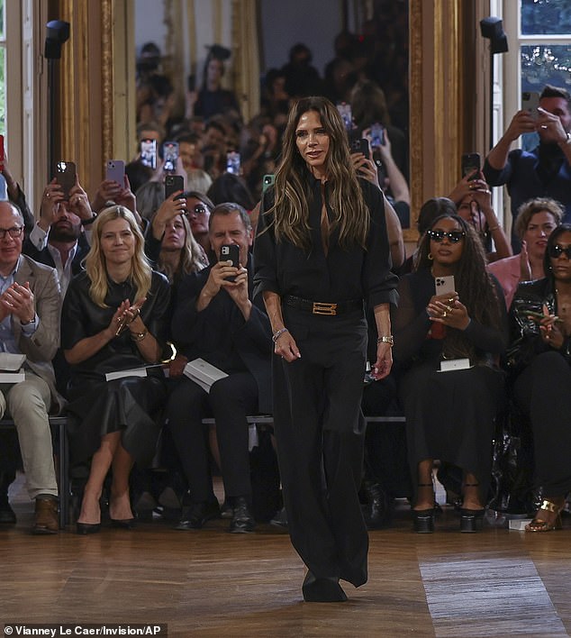 Praise: The star received rapturous applause and guests took out their phones to snap a photo of the star as she took center stage in a chic black outfit