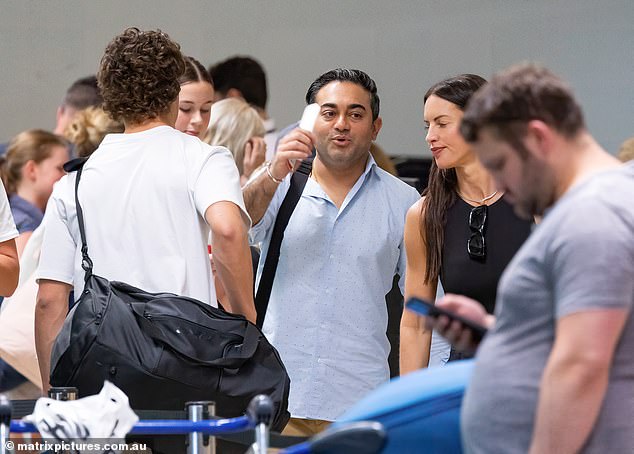 It is unclear what the frustration was about as the pair were apparently annoyed by all the commotion as they waited in line at Sunshine Coast Airport