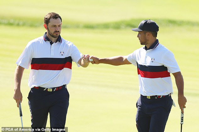 Cantlay and Xander Schauffele (right) lost their foursomes match with John Rahm and Tyrell Hatton as America's Ryder Cup woes continued