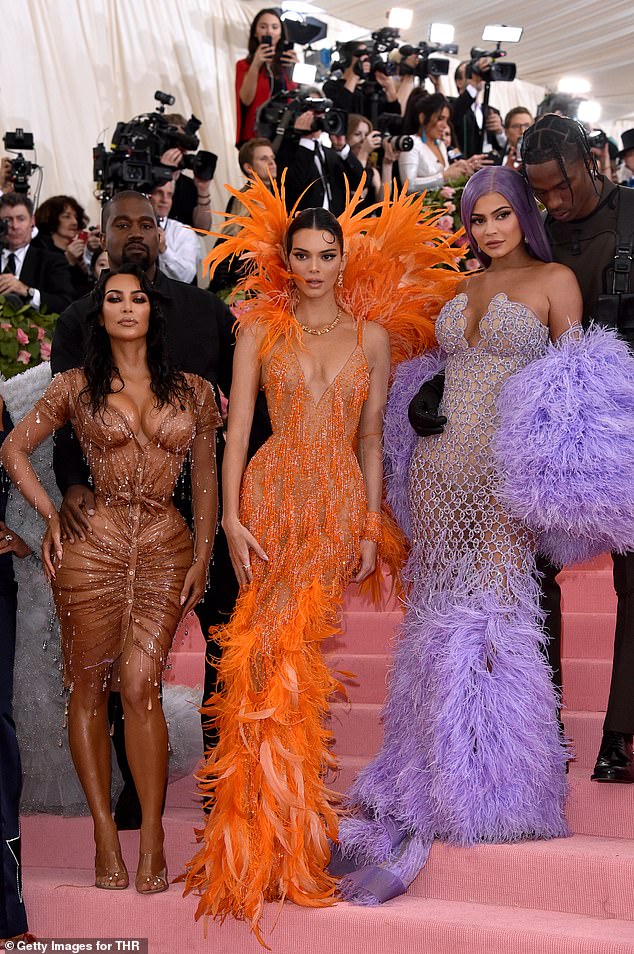 Family drama: Kendall and Kylie, who have 294 million and 399 million Instagram followers respectively, are Kim's half-sisters and remain aunts to Kanye's children (Kim, Kanye, Kylie, Kendall and Travis Scott pictured in 2019)