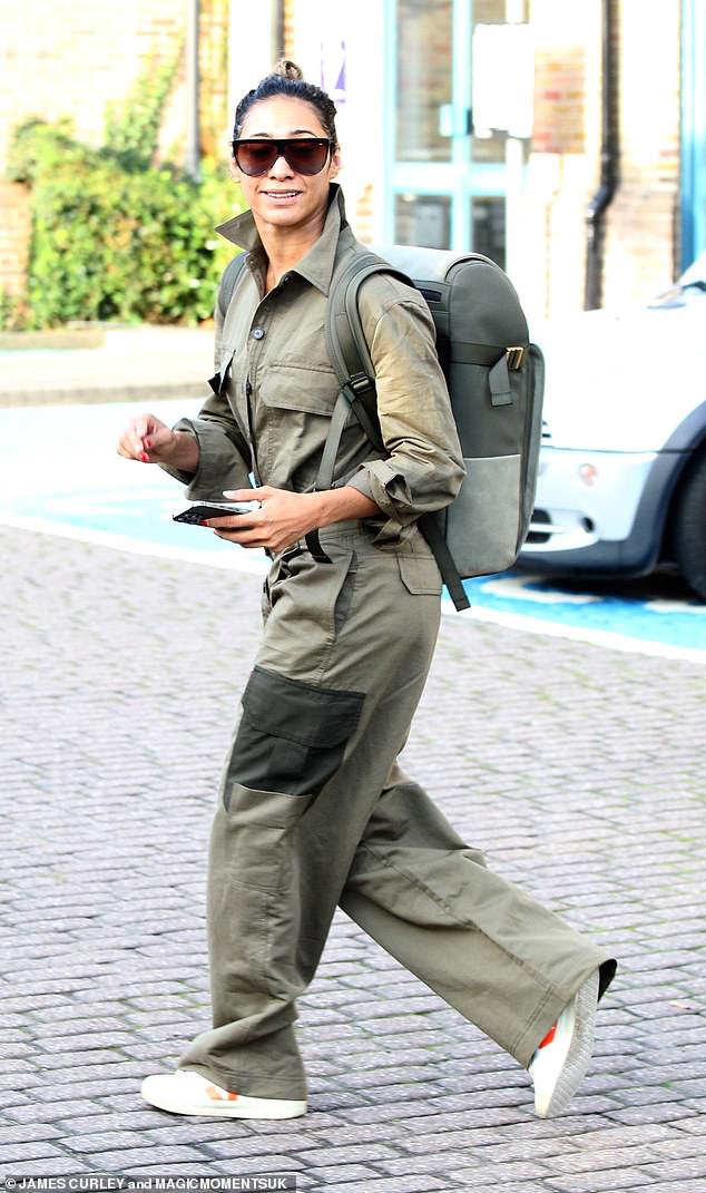 Sensational: Karen Hauer looked great in a khaki all-in-one overall