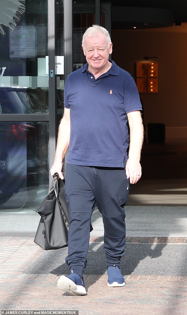 Keeping it casual, Les Dennis wore a simple navy blue polo shirt and sweatpants to the final dress rehearsals