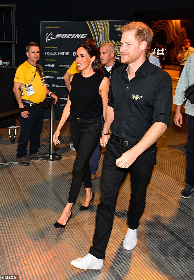 Meghan and Harry arrive hand in hand at the Merkur Spiel-Arena in Düsseldorf on September 13, 2023