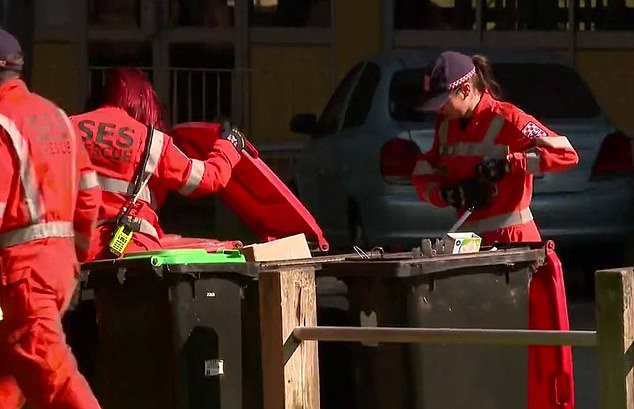 Forensic investigators and SES crews searched the social housing block on Saturday for clues