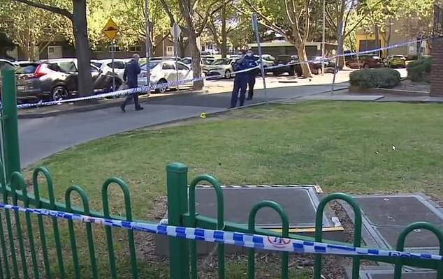 The entrance to the unit complex in North Melbourne remained cordoned off on Saturday