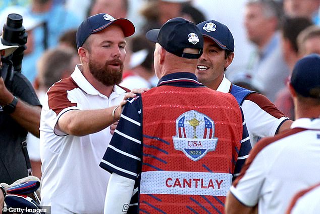 Shane Lowry was seen exchanging words with the legendary caddy on the putting green