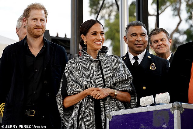 A Labor Party source previously confirmed that Meghan (centre, with Prince Harry, left) was 'networking among senior Democrats' with a view to building a grassroots campaign to fuel her political ambitions - with the US presidency as her ultimate goal