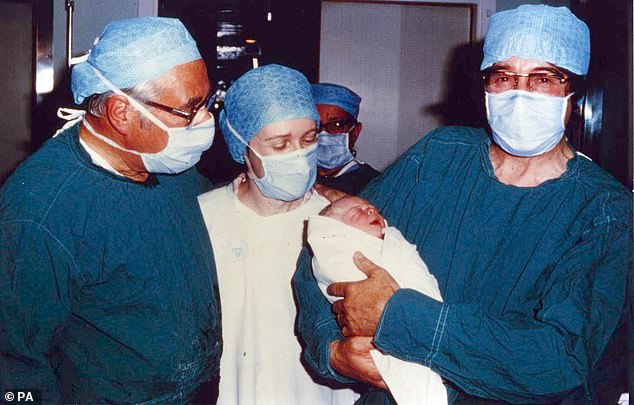 Pictured: gynecologist Patrick Steptoe, embryologist Jean Purdy and physiologist Robert Edwards at the birth of Louise Brown on July 25, 1978