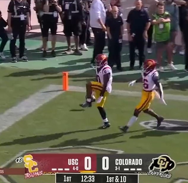 MarShawn Lloyd celebrates a touchdown for USC by doing the 'silencer' of LeBron James