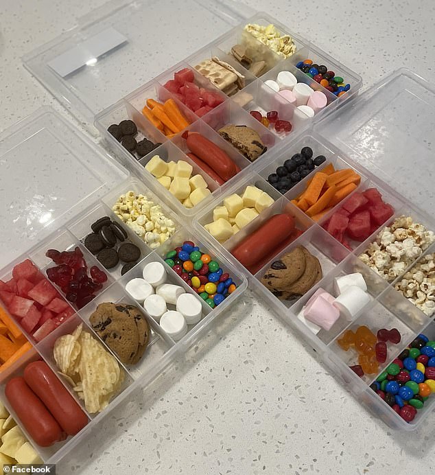 Vanessa from Sydney filled a 12-compartment organizer box from Kmart with a variety of snacks, including popcorn, mini Oreos, chips, marshmallows, cookies, cheese, meat and more