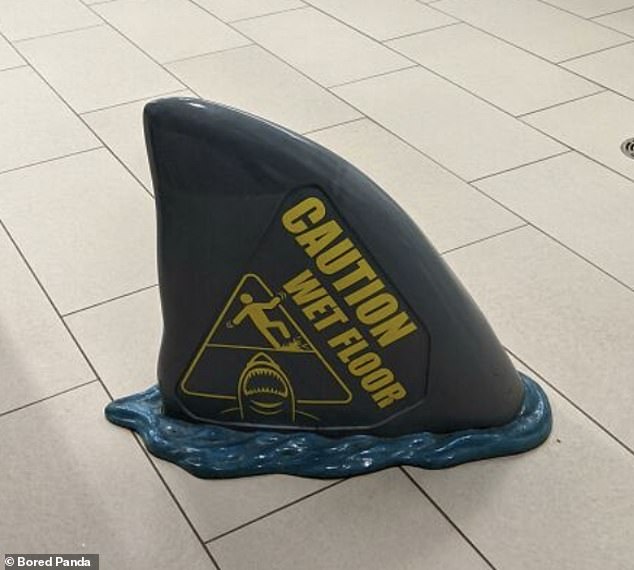 People from all over the world have been sharing the very witty boards they've seen and Bored Panda has collected the best in an online gallery.  Including a clever shark fin wet floor sign in Toronto, Canada, made people laugh