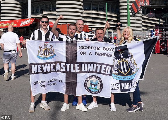 Newcastle United fans pose for a photo outside ahead of the UEFA Champions League Group F match at San Siro, Milan.  Photo date: Tuesday, September 19, 2023. PA Photo.  See PA story FOOTBALL Newcastle.  Photo credit should read as follows: Owen Humphreys/PA Wire RESTRICTIONS: Use subject to restrictions.  Editorial use only, no commercial use without prior permission from the rights holder.