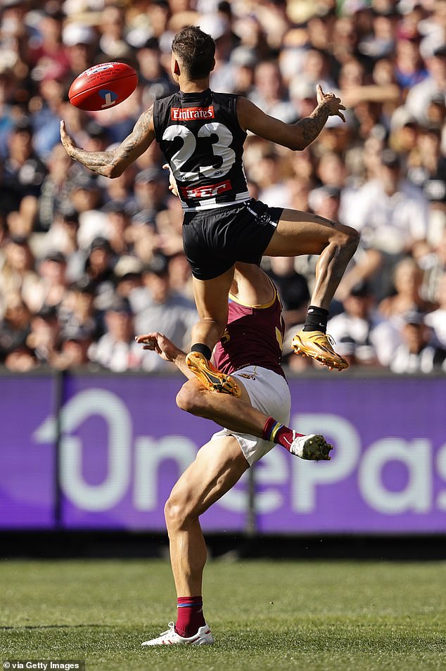 Bobby Hill launches himself into the stratosphere for a pivotal point in a Norm Smith Medal-winning performance