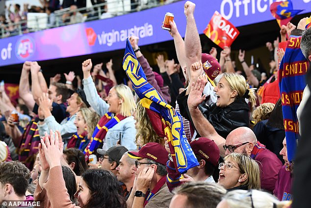 Fans (pictured) at Saturday's AFL preliminary final between the Brisbane Lions and Carlton were turned away by football great Sam Newman to jeer at the Indigenous Welcome to Country ceremonies