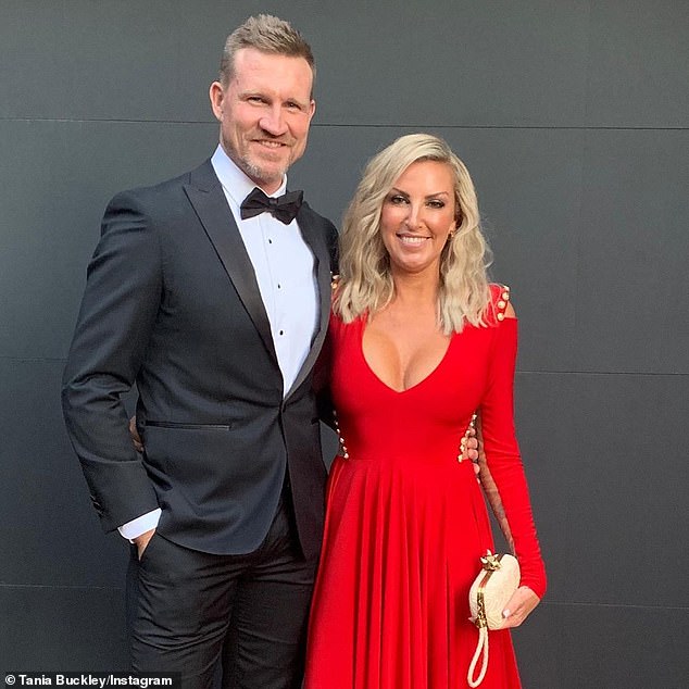 Nathan Buckley, 51, revealed on Sunday that splitting from his wife of 18 years, Tania Minnici, in 2020 was one of the most painful things he has ever experienced.  (The ex-couple are pictured together in happier times)