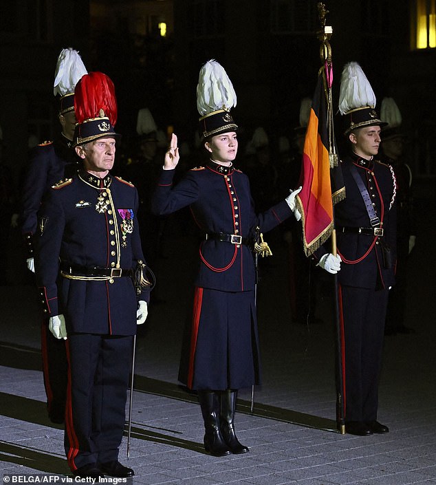 Princess Elisabeth stood next to her classmates last night as she took the oath in the presence of her family