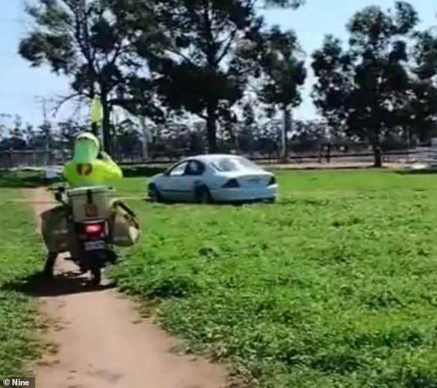 A postman has been hailed as a 'hero' for confronting a hoon doing burnouts in a park while driving a highly modified, unregistered car