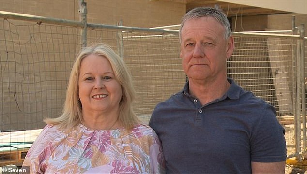 Karen and Colin Scarlett (pictured) have a house three-quarters finished and no idea how it will be completed after their builder went into voluntary administration on Tuesday