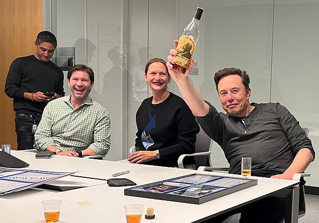 Elon Musk celebrates buying Twitter with colleagues on deal day by drinking bourbon