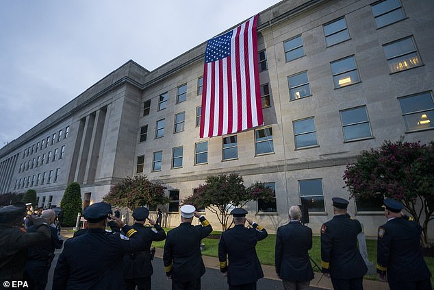 Officials were seen early Monday morning on the west side of the Pentagon unfurling an American flag — a hint at some of the ceremonies that would take place to mark the 22nd anniversary of the September 11 attacks