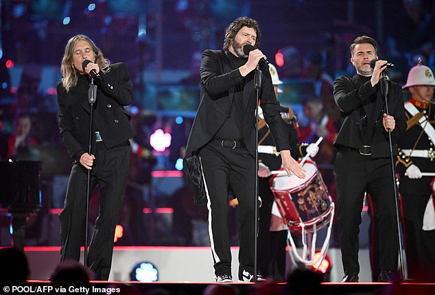 Setting everyone on fire again: Take That (LR) Mark Owen, Howard Donald and Gary Barlow plan to make their chart comeback with their first original song since 2017