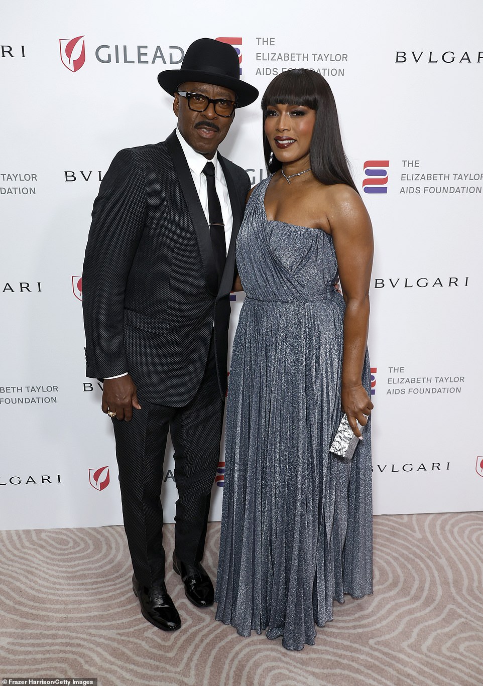 Date night!  Two-time Golden Globe winner Angela Bassett and her husband – two-time Emmy winner Courtney B. Vance – hosted the fourth annual Elizabeth Taylor Ball to End AIDS at the Beverly Hills Hotel on Thursday.