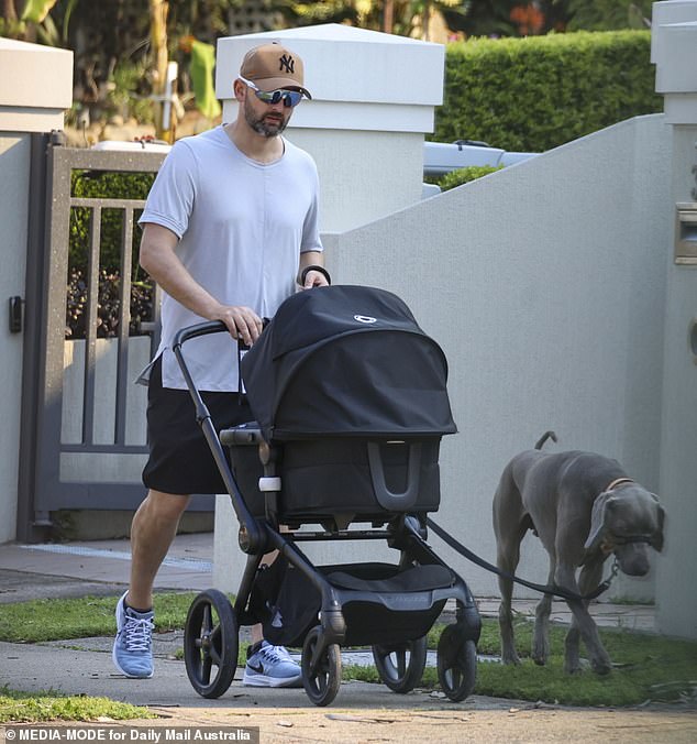 Lyon was spotted pushing his new baby in a stroller near his western Sydney home earlier this month, while taking his Weimaraner dog Gus for some exercise.