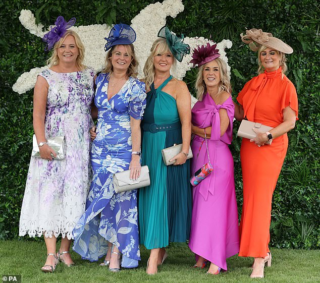 Glamorous partygoers dressed to the nines as they caught the last of the late summer sunshine at Ayr Racecourse today