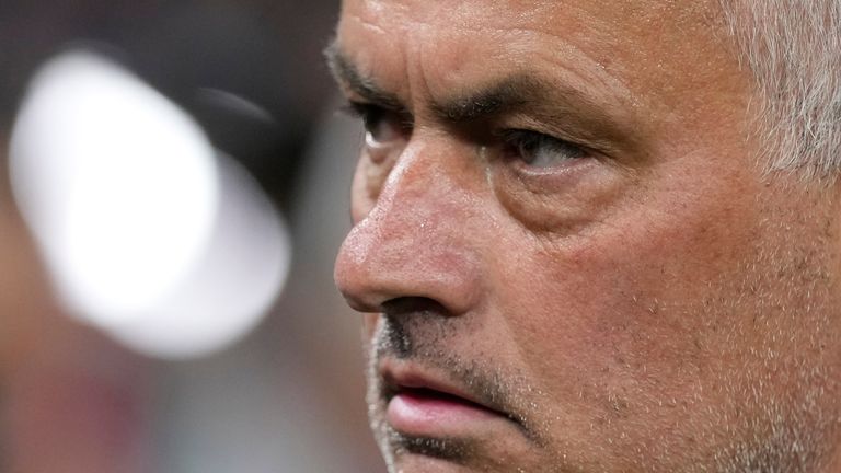 Roma's head coach Jose Mourinho walks onto the pitch after losing the Europa League final to Sevilla at the Puskas Arena stadium in Budapest, Hungary, Thursday, June 1, 2023. (AP Photo/Darko Bandic)