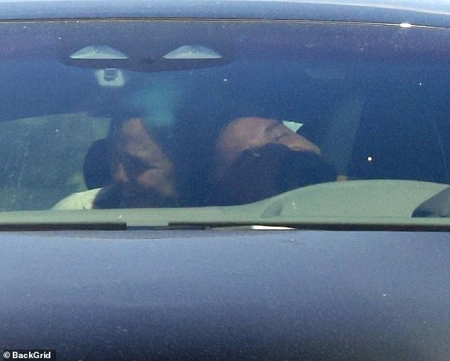 Friendly exes: Ben Affleck and his ex Jennifer Garner turned out to be friendly exes on Friday when they were spotted sharing an affectionate moment in his car