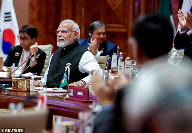 Indian Prime Minister Narendra Modi pounded the table as he announced that G20 leaders would hold a joint communiqué at this year's Leaders' Summit in New Delhi.  Last year, language surrounding the war in Ukraine prevented an agreement on an official statement